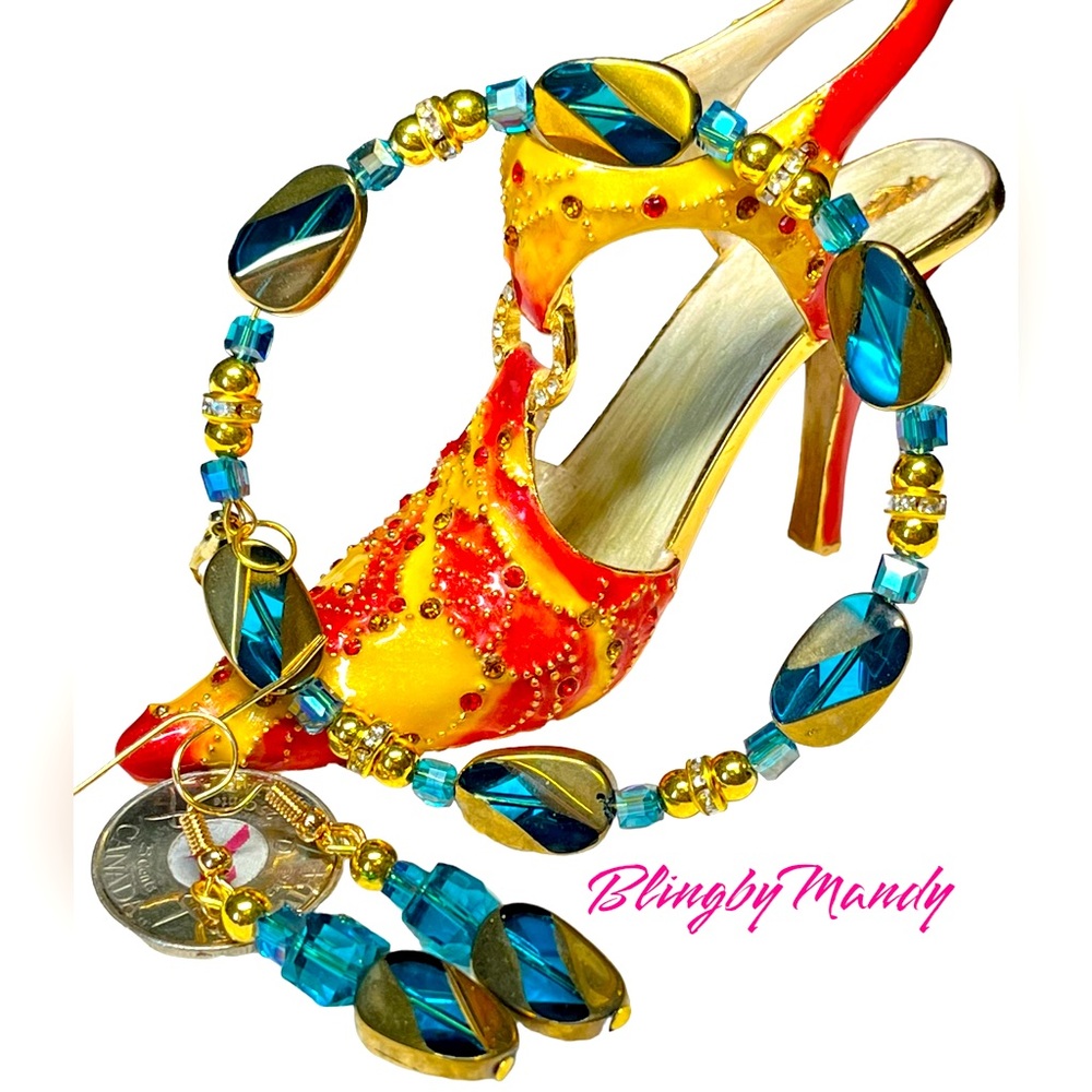 Two piece set blue and gold bracelet and earrings